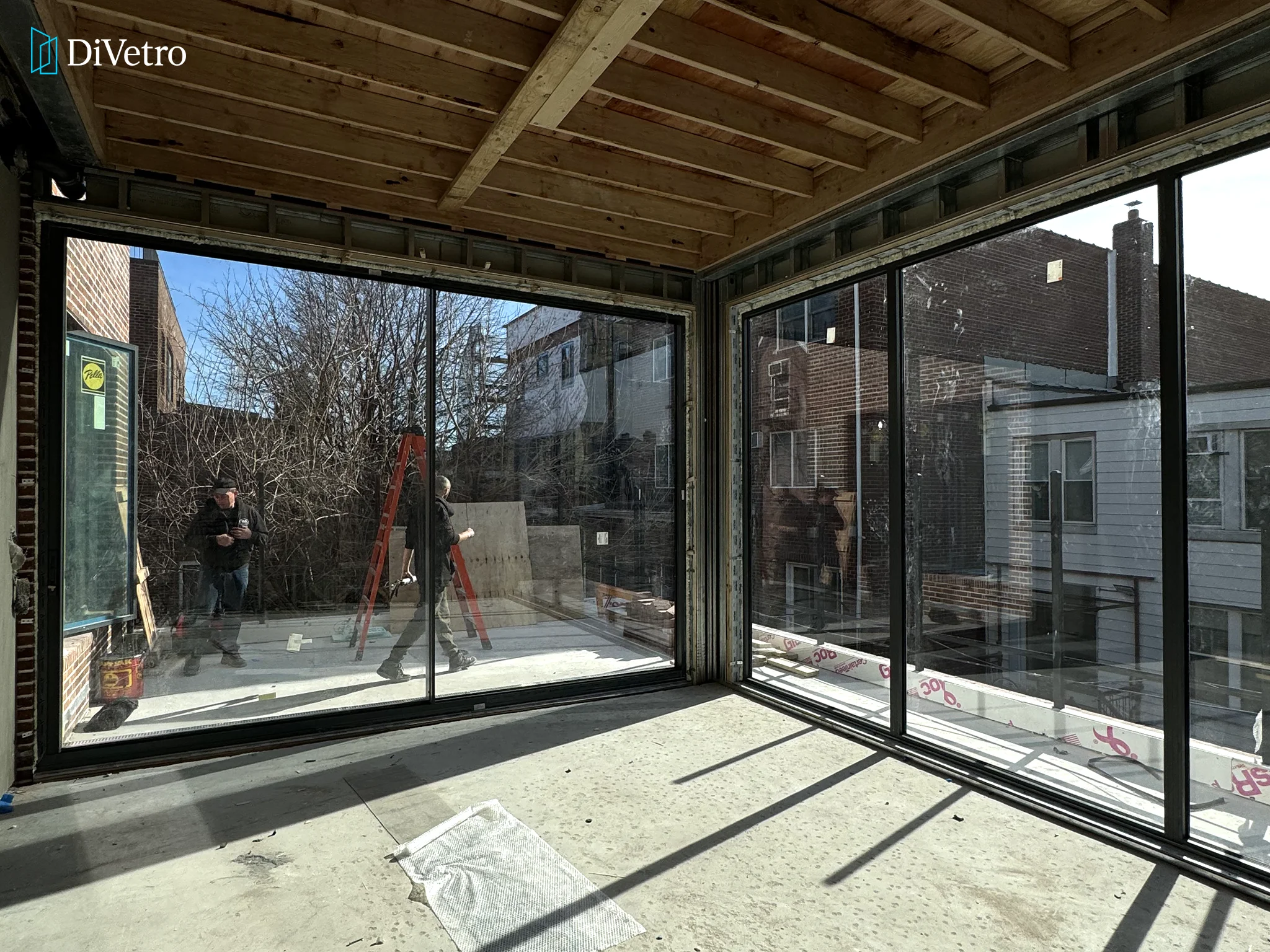 Aluminum sliding doors with Corvision system — custom European glazing by DiVetro