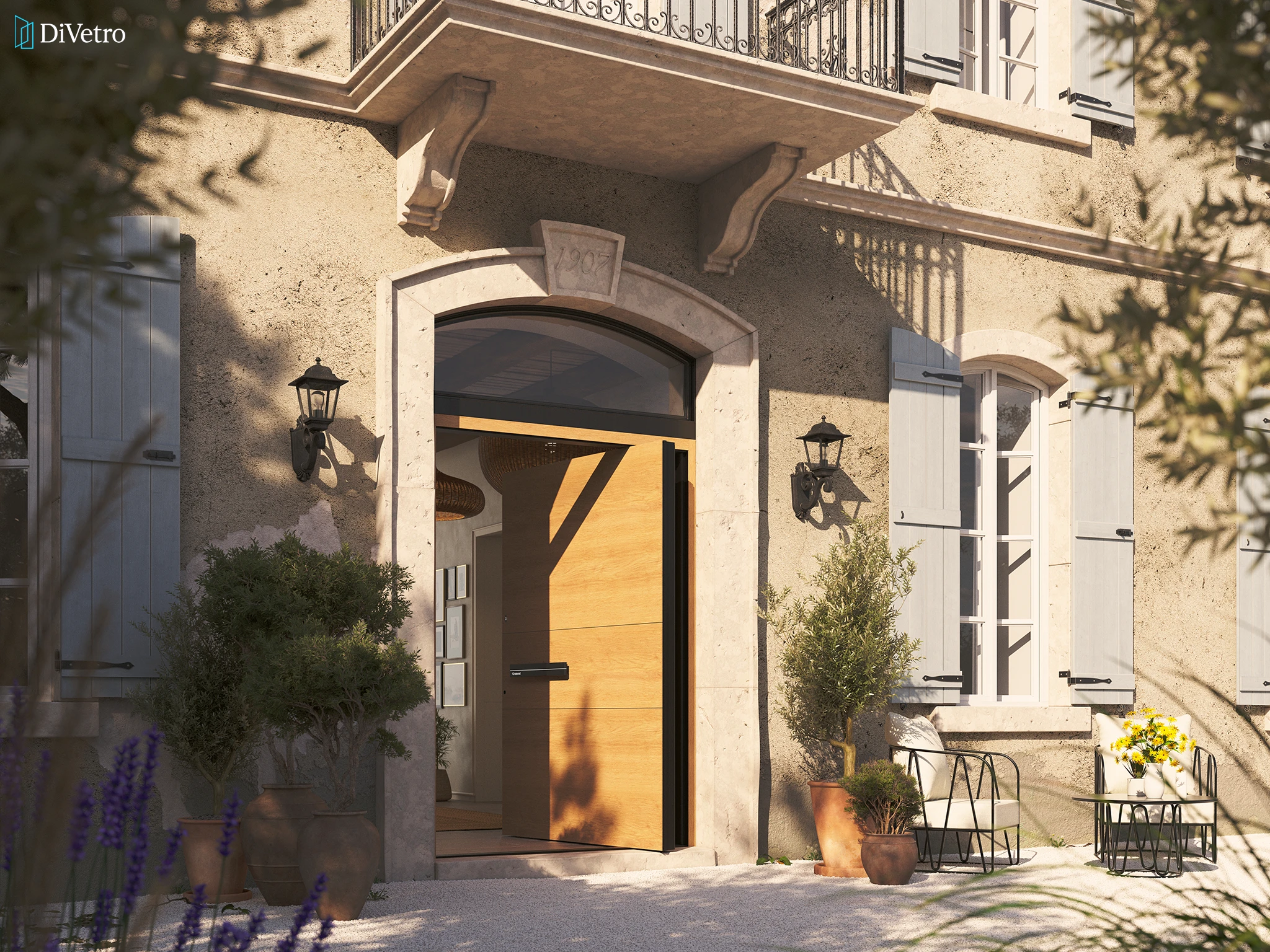 Large black Pirnar pivot entrance door in modern stone-clad luxury residence