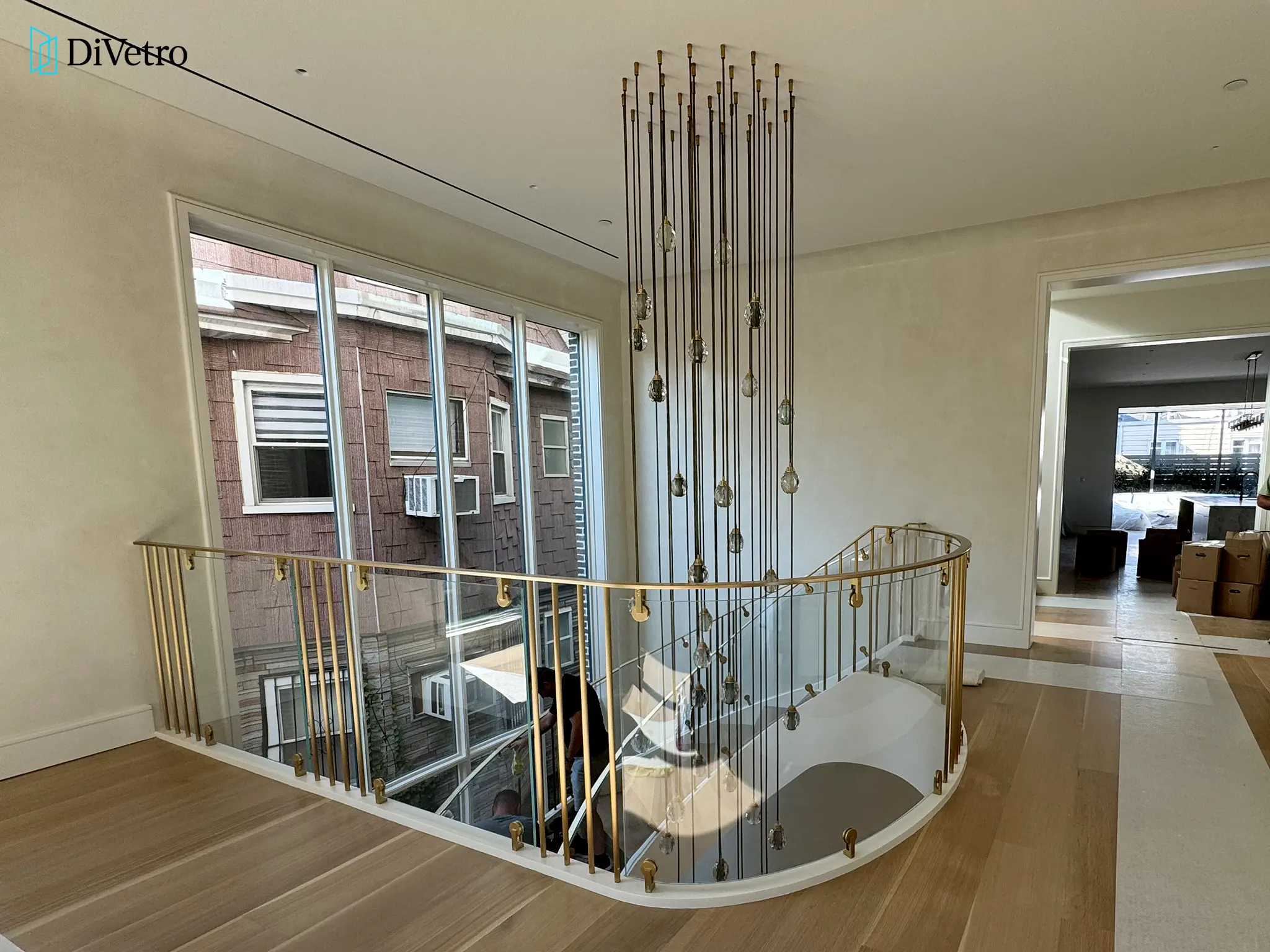 Real project — curved glass staircase with frameless railings