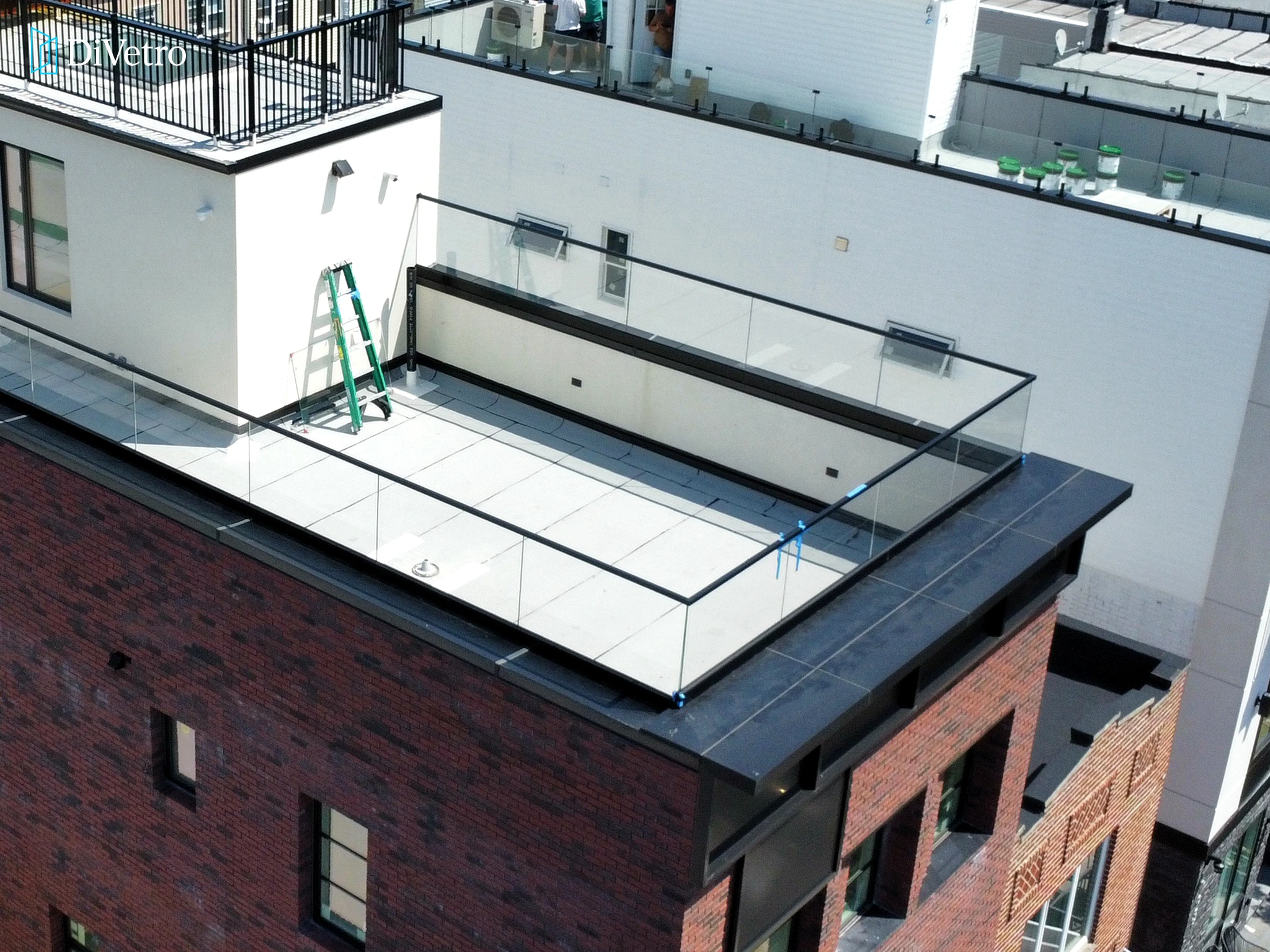 Real project — glass railings installed on a rooftop terrace
