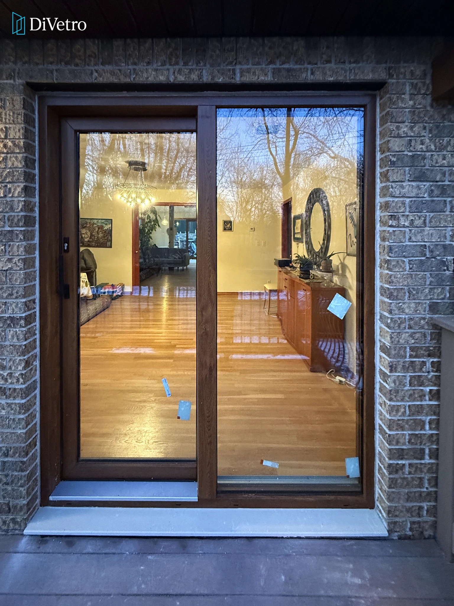 Real project — sliding glass doors with walnut wood finish