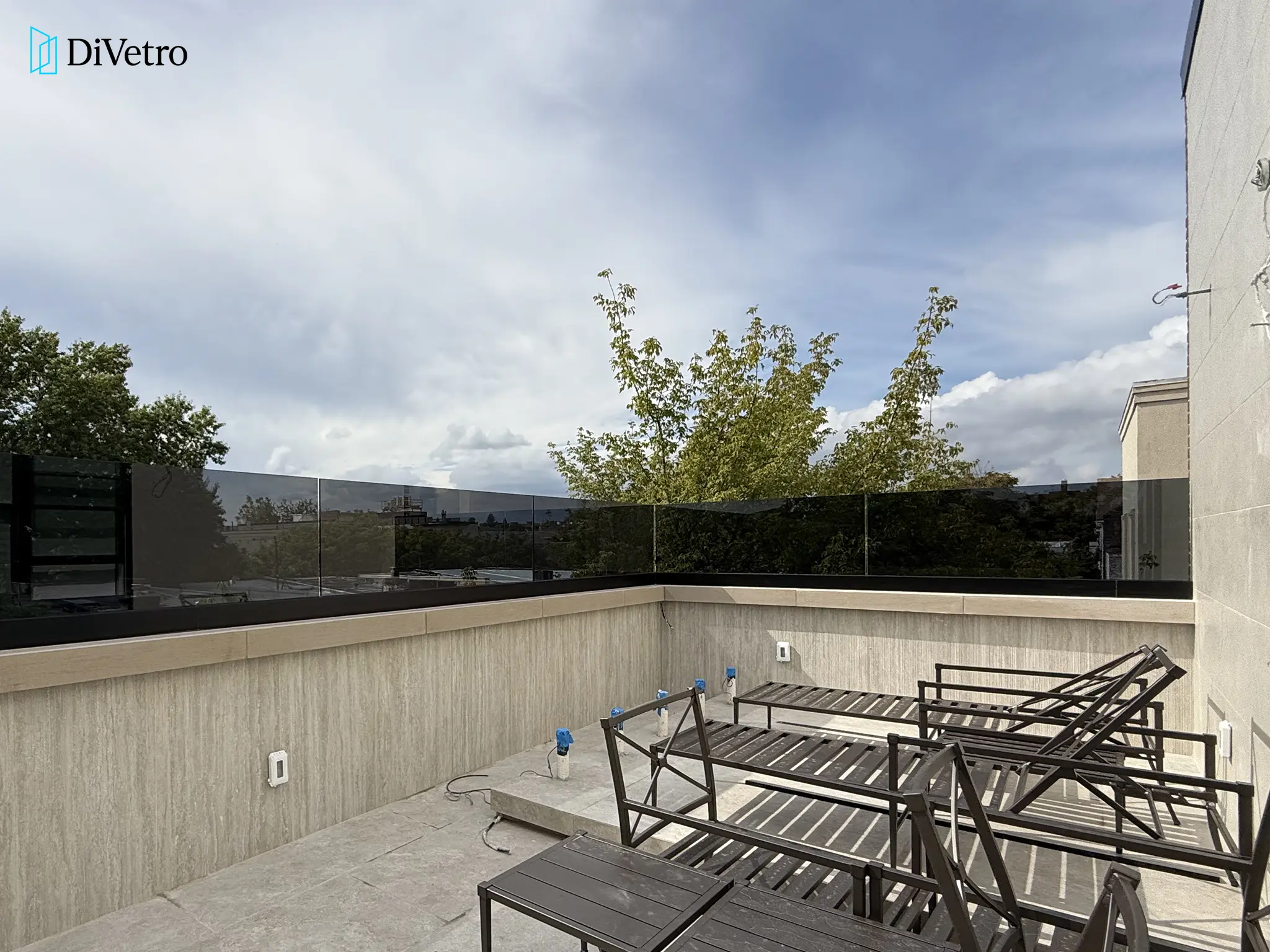 Real project — tinted glass railings on a rooftop terrace