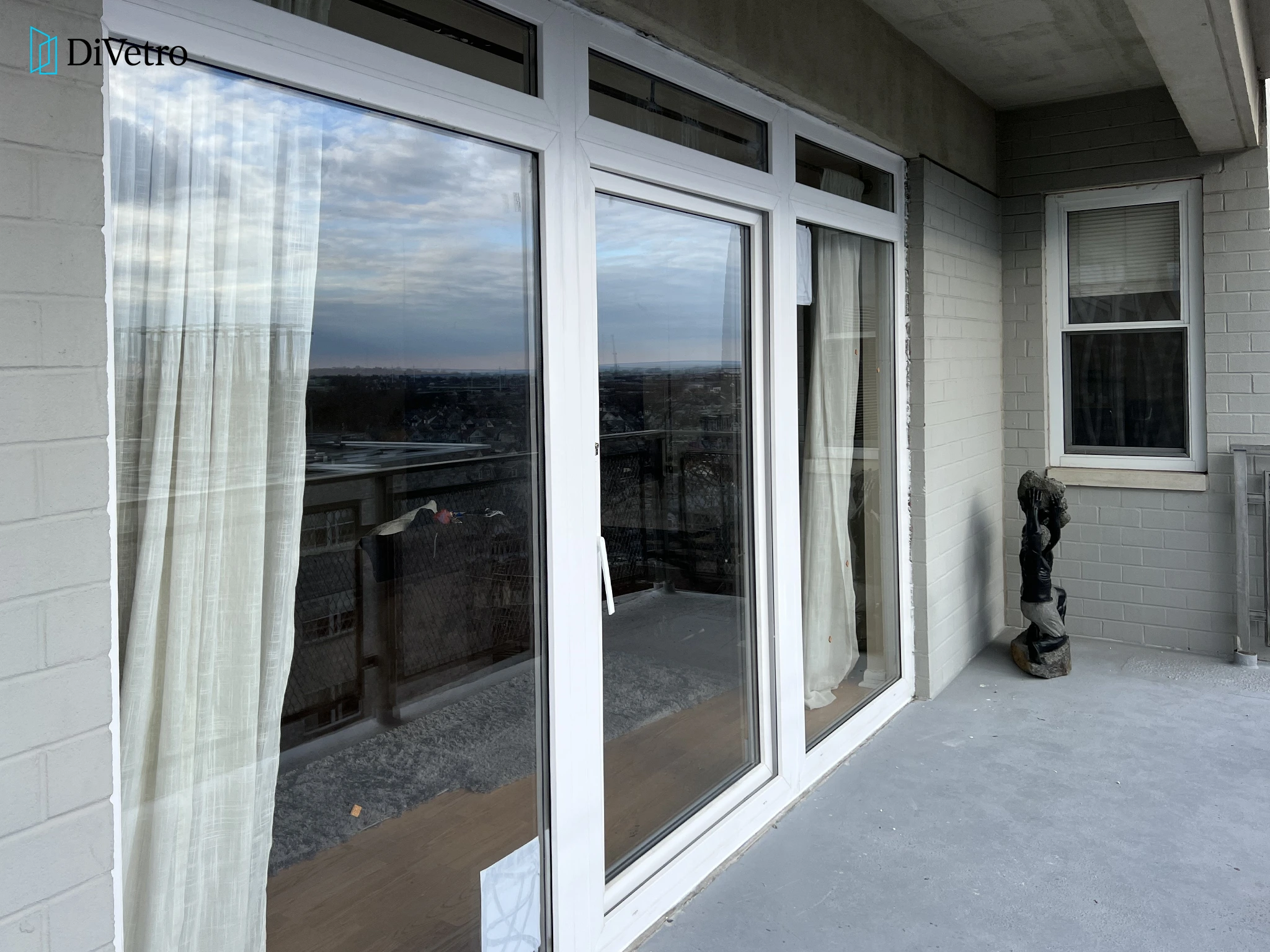 Real project — triple sliding patio doors with white frames
